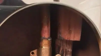 Repair work on a shower valve.